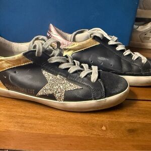 Golden Goose Black and Gold Sneakers